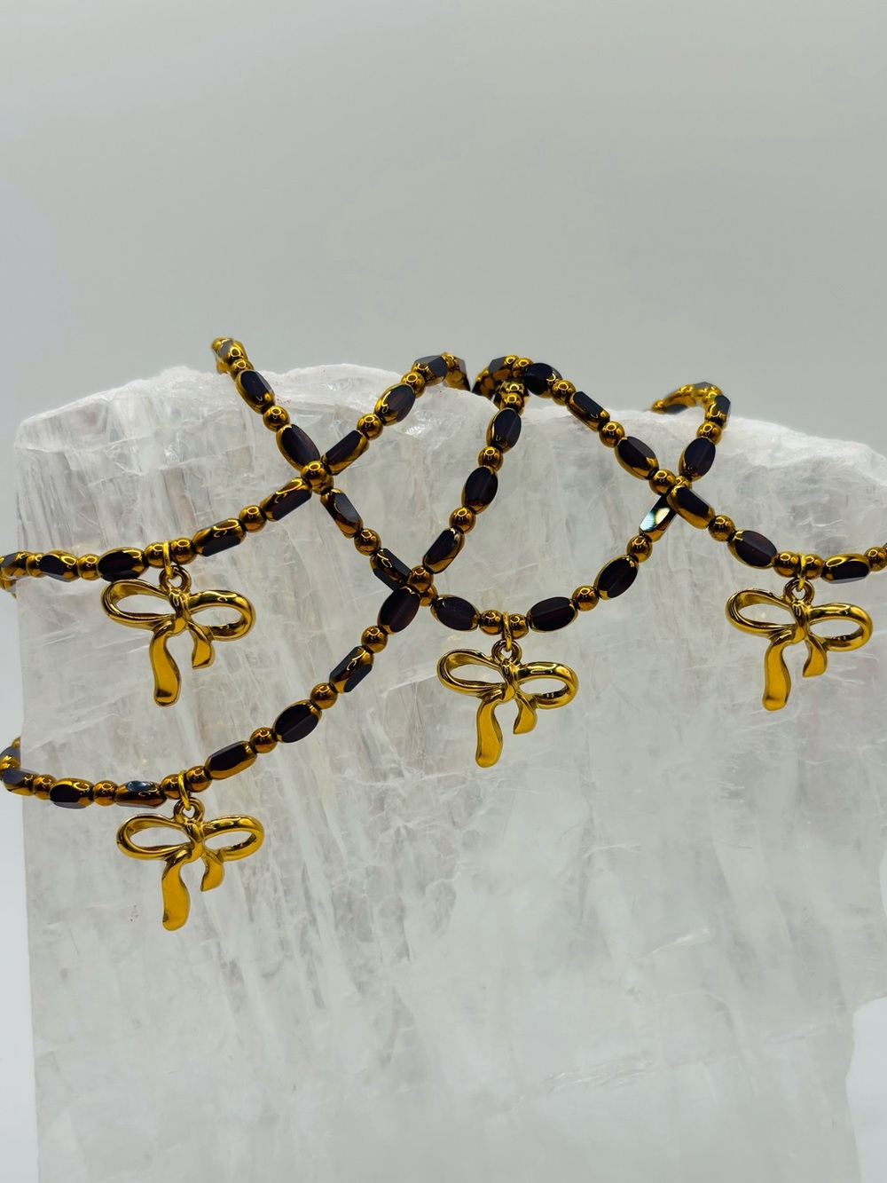*ANKLET* S. Steel Gold Bow with Purple Crystal Stretchy Anklet